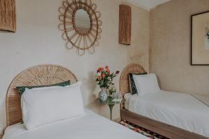 Postel nebo postele na pokoji v ubytování Riad Bab Ahmar