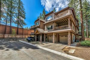 a house with a car parked in front of it at Tahoe Woods 502 at Stateline Lake Heavenly Village in South Lake Tahoe