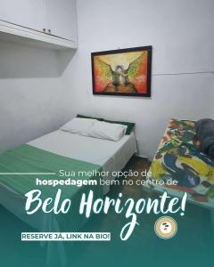 Ένα ή περισσότερα κρεβάτια σε δωμάτιο στο Savassi Hostel
