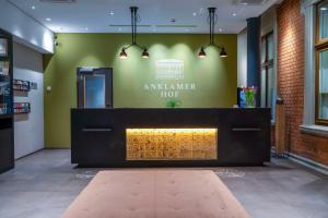 a wellness center with a wellness calendar on the wall at Hotel Anklamer Hof, BW Signature Collection in Anklam