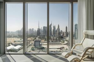 a room with a view of the city from a window at SIRO One Za'abeel in Dubai