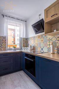 Kuchyň nebo kuchyňský kout v ubytování Premium Apartment Mechaniczna 5W