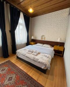 A bed or beds in a room at Greek House with Terrace - Bachman Hause