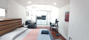 Una televisión o centro de entretenimiento en Intimate & Complete Studio in Anzures 10 fotos más