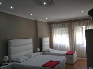 Cama o camas de una habitación en Royal Porto City