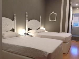 Cama o camas de una habitación en Royal Porto City