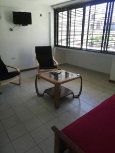 TV a/nebo společenská místnost v ubytování Apartamento vacacional en Costa Azul-G4 + 3 fotografie