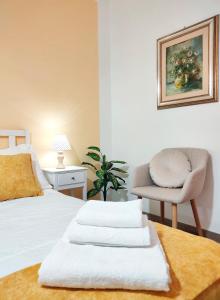 Posteľ alebo postele v izbe v ubytovaní Lollo House Borgo Opifici