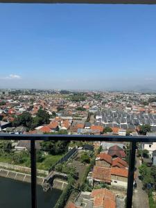 an aerial view of a city with houses and buildings at 温馨小屋18 in Bandung