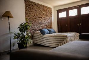 Postel nebo postele na pokoji v ubytování Topohouse + 3 fotografie