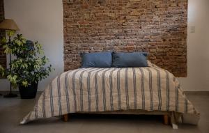 Postel nebo postele na pokoji v ubytování Topohouse