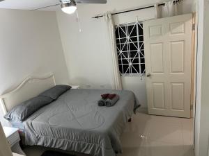 Postel nebo postele na pokoji v ubytování Mandeville ingleside luxury