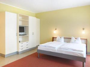 Postel nebo postele na pokoji v ubytování Strandläufer Classic 108 + 12 fotografií