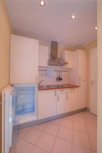 O bucătărie sau chicinetă la Schneeeule 224 +14 fotografii