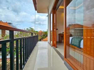 Balkon ili terasa u objektu Dewi Putri House