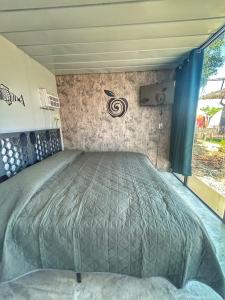 a bed in the back of a truck at Apple House cerca de la playa in Barra de Navidad +28 photos