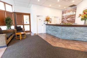 a lobby of a waiting room with a counter at Sundowner Hotel Motel in Caboolture