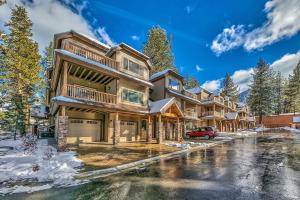 a house with a car parked in front of it at Tahoe Woods 101 at Stateline - Walk to Lake in South Lake Tahoe