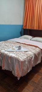 Łóżko w pokoju z: w obiekcie Hostal Chavin w mieście Lima