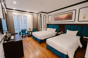 Postel nebo postele na pokoji v ubytování A&D Luxury Hotel + 34 fotografií