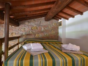 Postel nebo postele na pokoji v ubytování Montaione Oasis Shared Villa
