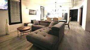 a living room with a couch and a table at Alma 2 bedroom Sleeps 6 in Alma