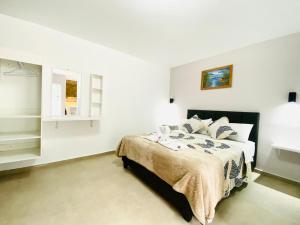 Ένα ή περισσότερα κρεβάτια σε δωμάτιο στο Casa Gaviota Dorada