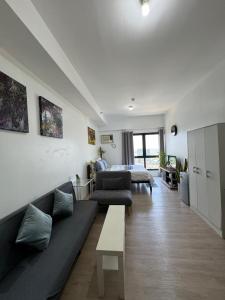 Zona de estar de Vinia Infinity Studio 1 Near Malls with WiFi and Netflix