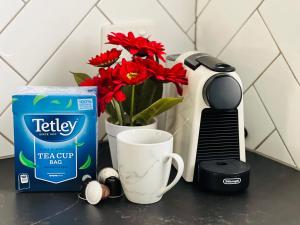 Kaffee-/Teezubehör in der Unterkunft Hectorville Luxe Haven Suite