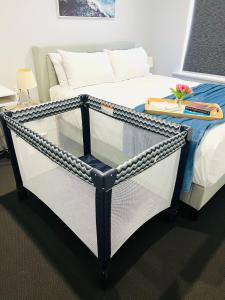 Ein Bett oder Betten in einem Zimmer der Unterkunft Hectorville Luxe Haven Suite