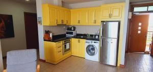 Kuchyň nebo kuchyňský kout v ubytování Seaview Condo B63