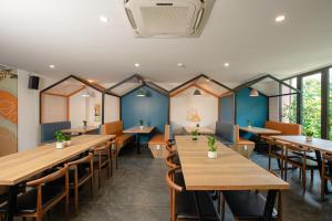 Veitingastaður eða matsölustaður á FIRST Studio Hotel Da Nang