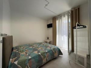 Llit o llits en una habitació de Casa Vacanza Trecastelli Senigallia (AN)