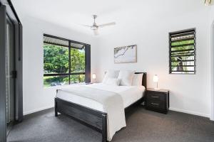 Postel nebo postele na pokoji v ubytování Royal Pavilions 8