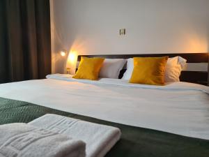 Postel nebo postele na pokoji v ubytování Vila Șoimul Predeal + 26 fotografií