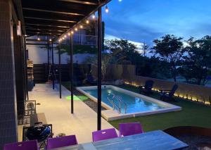 Piscina di ＩＲＡＧＯ　ＡＲＴ　 ＨＯＴＥＬ 　THECAPE o nelle vicinanze