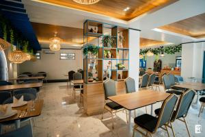 Restoranas ar kita vieta pavalgyti apgyvendinimo įstaigoje Bernese Resort Hotel powered by Cocotel
