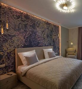Ein Bett oder Betten in einem Zimmer der Unterkunft Modern Entire Apartments Colombes