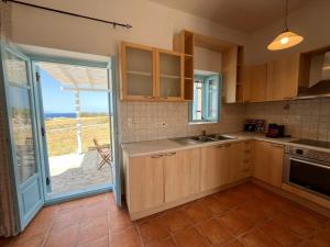 Kuchyň nebo kuchyňský kout v ubytování Mediterranean Blue Escape