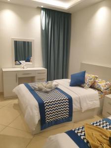 A bed or beds in a room at Sharm Hills