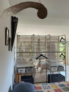 a room with a glass shelf in a room at MAISON indépendante VUE MER au cœur de la NATURE in Toulon