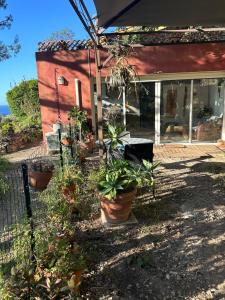 Vonkajšia záhrada v ubytovaní MAISON indépendante VUE MER au cœur de la NATURE