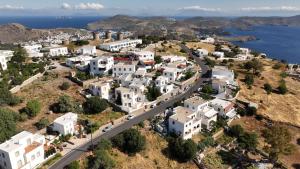 an aerial view of a town with white houses at Manos House in Chora in Patmos