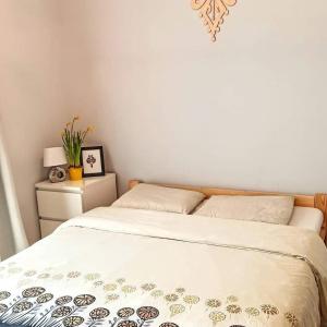 Postel nebo postele na pokoji v ubytování Kwatera u Somsiada -Apartament