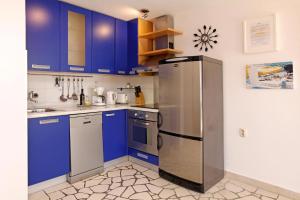 Kuchyňa alebo kuchynka v ubytovaní Apartments Mel