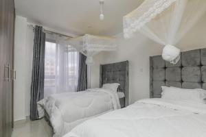 Ένα ή περισσότερα κρεβάτια σε δωμάτιο στο Amalia BNB Apartment