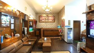 TV a/nebo společenská místnost v ubytování Golden Homestay