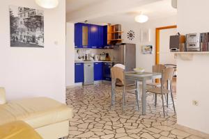 Kuchyňa alebo kuchynka v ubytovaní Apartments Mel