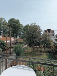 a view of a park from a balcony at Niki Seaside Apartments in Platamonas