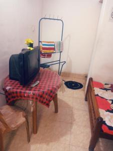 Ένα ή περισσότερα κρεβάτια σε δωμάτιο στο Kunam Beach Rest Inn
